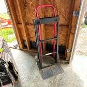 Two-wheel hand truck, missing a wheel