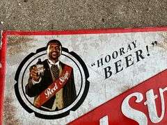 Red Stripe Beer metal sign