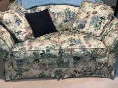 Sealy floral love seat with throw and throw pillows