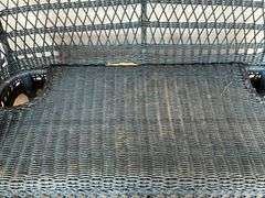 Wicker loveseat 52" W