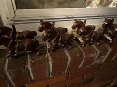 Cast iron 8-horse hitch and wagon