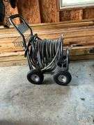 Four-wheel hose reel with hose