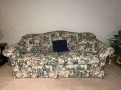 Sealy floral sofa with throw pillows