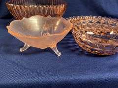 Pink Depression Glass pieces, up to 12" W