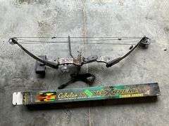 PSE compound bow, 29" draw length, 70 lb. weight, pin sights, arrow release