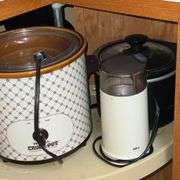 Crock pots, coffee grinder, Mr. Coffee maker, french fry cutter