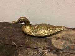 Brass duck, male & female pheasants