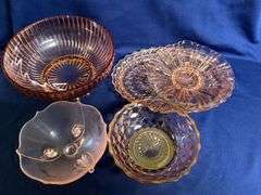 Pink Depression Glass pieces, up to 12" W