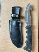 Remington skinning knife, 4" blade and leather sheath