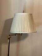 Floor lamp with swing arm