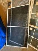 Quatar single hung (1 broken pane) 33" x 67". 3 assorted screens
