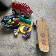 Plastic fire truck, foot ball, frisbee, skateboard, etc.