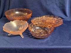 Pink Depression Glass pieces, up to 12" W