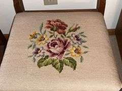 Pair of vintage chairs with needlepoint seats