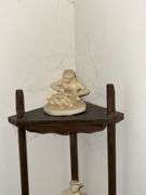 Corner curio shelf, with figurines