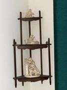 Corner curio shelf, with figurines