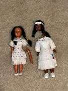 Pair of Indian dolls, with real leather dresses