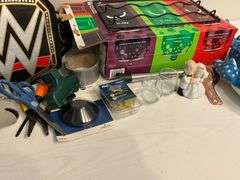 Fridge wine rack, hat, shot glasses, WWF fanny pack, etc.