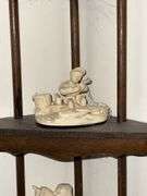 Corner curio shelf, with figurines