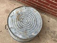 Galvanized tub, no handles, rust in bottom