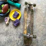 Plastic fire truck, foot ball, frisbee, skateboard, etc.