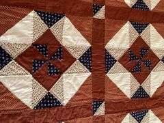 Patchwork pinwheel quilt, hand quilted