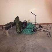 Garden hose, sprinkler, gardening seat, leaf bag holder, tarp, etc.