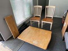 Wooden kitchen table with leaf and 2 chairs, needs refinishing and assembly