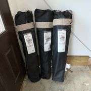 Three sherpa cozy chairs in bags
