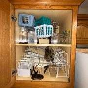 Small plastic crates, dish organizers, plate holders, wire basket, etc.