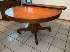 Oak single pedestal dining table, split in top