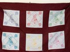 Sunbonnet Sue embroidered wall hanging