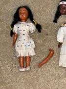 Pair of Indian dolls, with real leather dresses