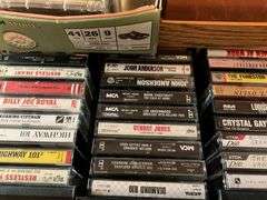 Assortment of music cassettes and CDs