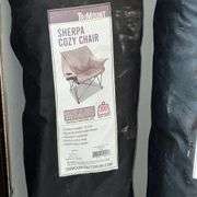 Three sherpa cozy chairs in bags