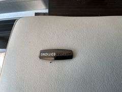 Sectional sofa, bonded leather?, cat scratch on corner