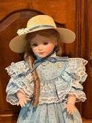 Porcelain doll on stand, 24" T