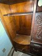Antique secretary with curved glass and drop front desk with key
