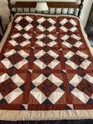 Patchwork pinwheel quilt, hand quilted