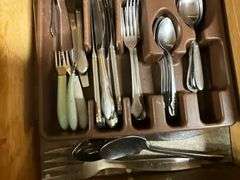 Assortment of flatware, knives