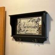 Mirrored coat hook