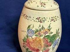 Pottery cookie jar with fruit pattern