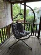 Hanging egg chair with cushion and stand