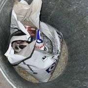 Snow shovel, rake, mop, yard sticks, trash bags, ice melt, galvanized trash can, fire extinguisher