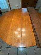 Oak single pedestal dining table, split in top