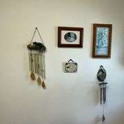 Contents of laundry room, cleaning supplies, light bulbs, ironing board