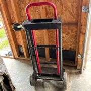 Two-wheel hand truck, missing a wheel