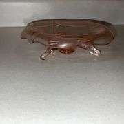 Three-footed pink candy dish