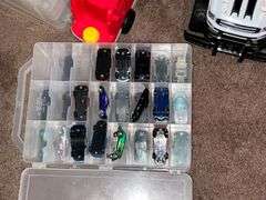 Assortment of toys, Nerf guns, cars, trucks