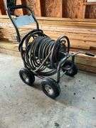 Four-wheel hose reel with hose